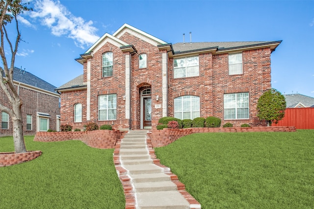 view of front of home with a front yard