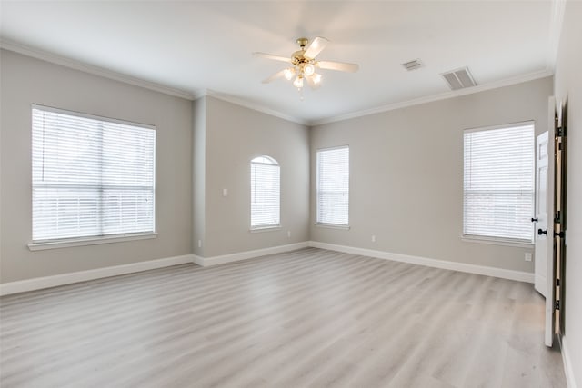 spare room with ceiling fan, light hardwood / wood-style flooring, and a healthy amount of sunlight