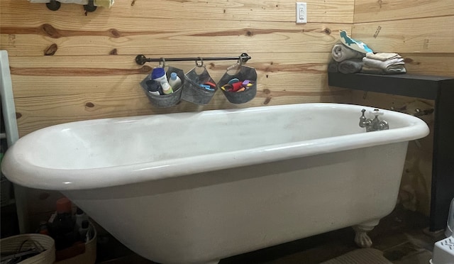 bathroom featuring a tub to relax in