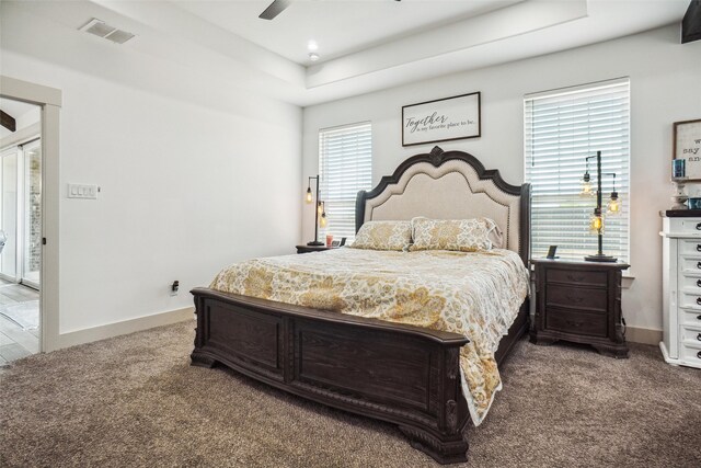 carpeted bedroom with ceiling fan