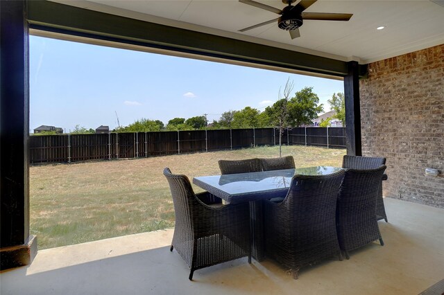 view of patio / terrace featuring ceiling fan