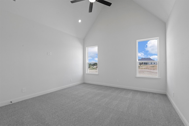 interior space featuring high vaulted ceiling and ceiling fan