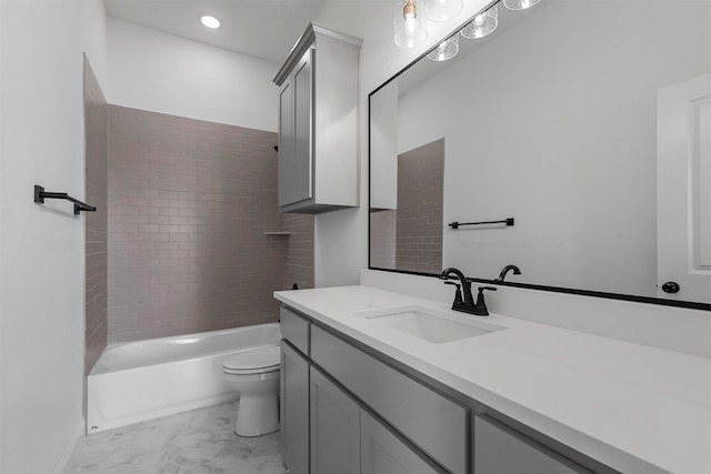 full bathroom with tiled shower / bath combo, toilet, tile patterned flooring, and vanity