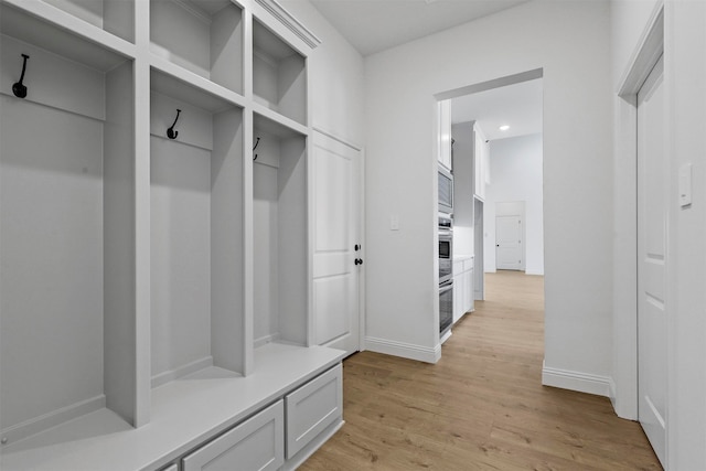 mudroom with light wood-type flooring