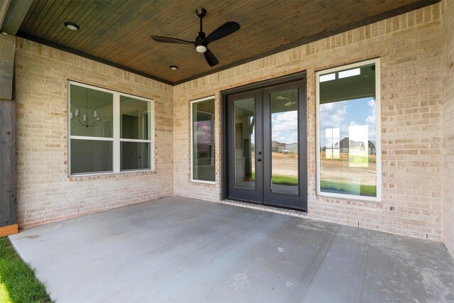 view of patio with ceiling fan and french doors