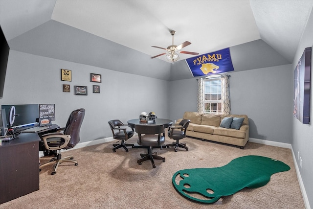 carpeted home office featuring baseboards, a ceiling fan, and vaulted ceiling