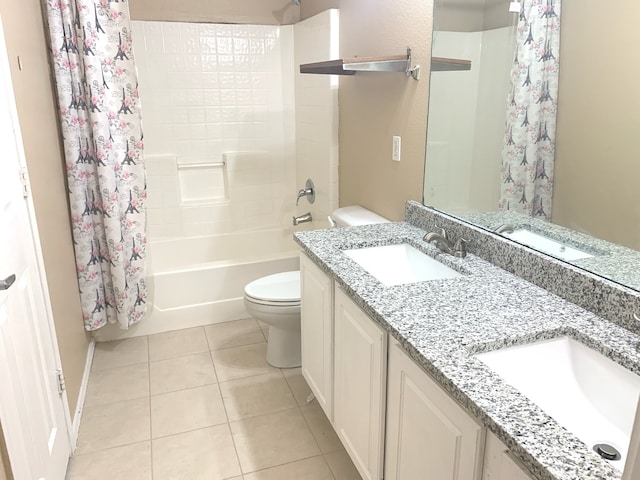 full bathroom featuring tile patterned floors, shower / bath combination with curtain, toilet, and vanity