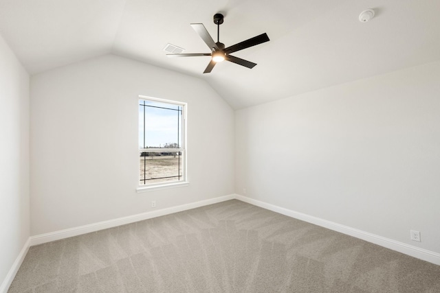 bonus room with light carpet, vaulted ceiling, and ceiling fan