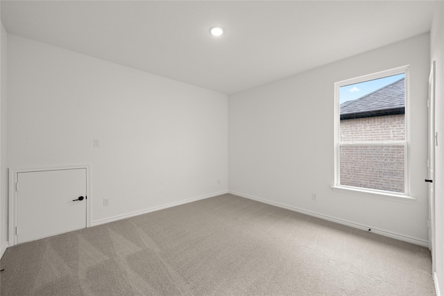 empty room with carpet flooring