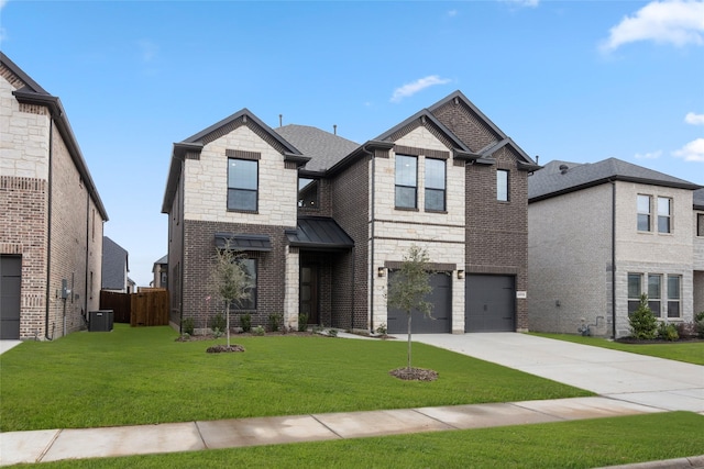 view of front of house featuring central AC unit, a garage, and a front yard