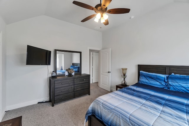 bedroom with carpet floors, vaulted ceiling, and ceiling fan