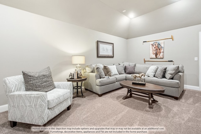 living room featuring carpet and lofted ceiling