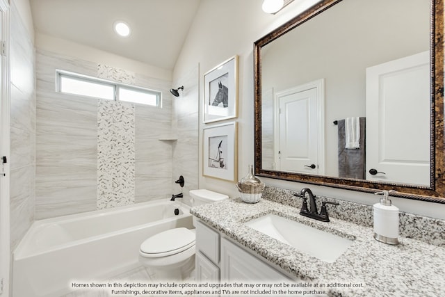 full bathroom with tiled shower / bath combo, toilet, vanity, and lofted ceiling