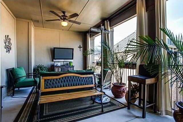 interior space featuring a wealth of natural light and ceiling fan