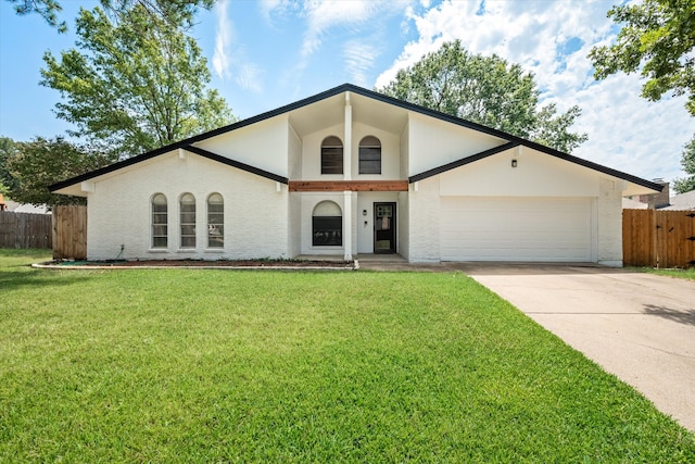 single story home with a front yard and a garage