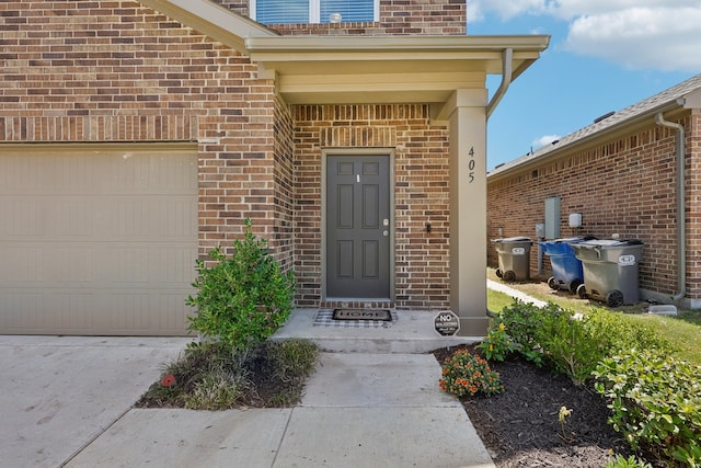 entrance to property featuring a garage