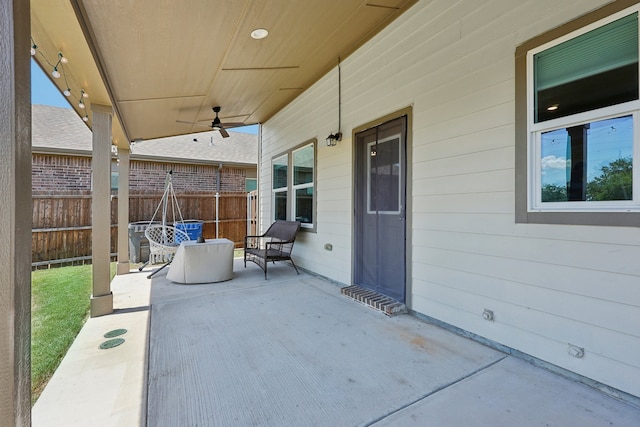 view of patio / terrace featuring ceiling fan