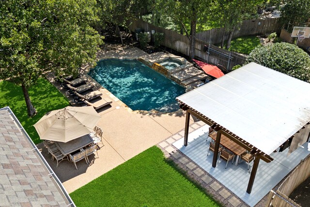 view of pool featuring an in ground hot tub and a patio