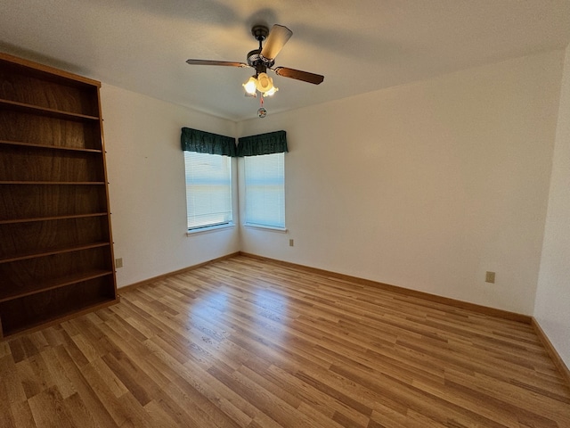 interior space with ceiling fan and hardwood / wood-style floors