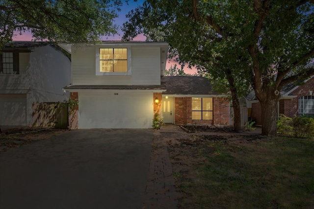 front of property with a garage