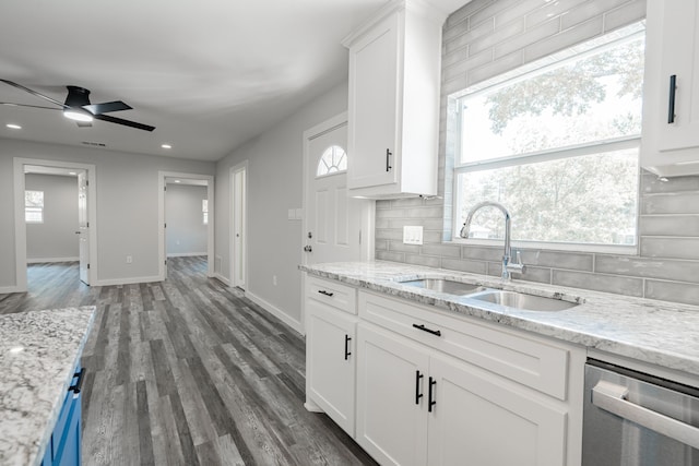 kitchen with sink, hardwood / wood-style flooring, decorative backsplash, dishwasher, and ceiling fan