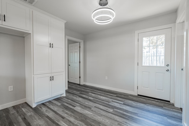 interior space with hardwood / wood-style flooring