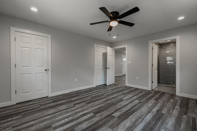 unfurnished bedroom featuring ceiling fan, hardwood / wood-style floors, and ensuite bath