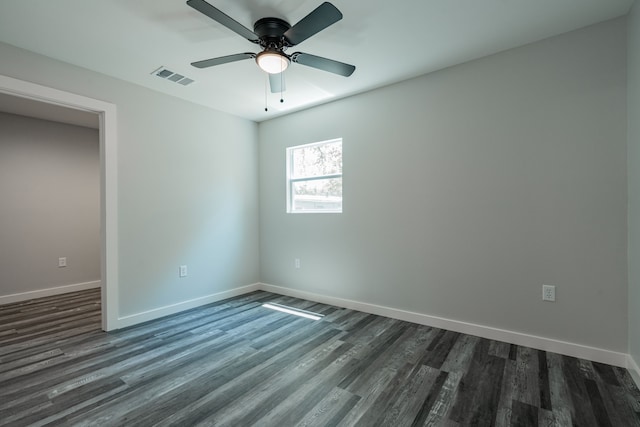 unfurnished room with ceiling fan and hardwood / wood-style flooring