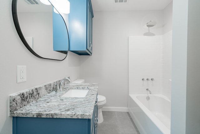 full bathroom featuring tile patterned flooring, washtub / shower combination, vanity, and toilet