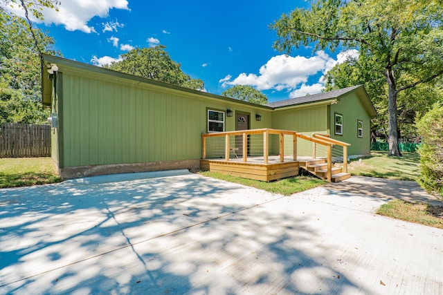 back of property with a patio