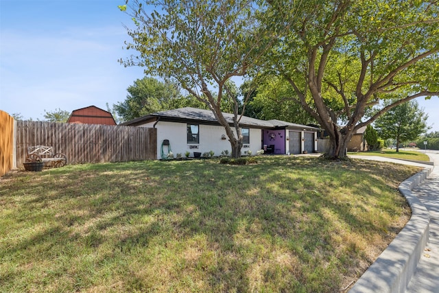 view of front facade with a front yard