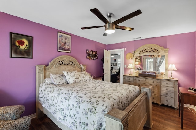 bedroom featuring ceiling fan and dark hardwood / wood-style flooring