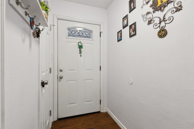 doorway featuring dark hardwood / wood-style flooring