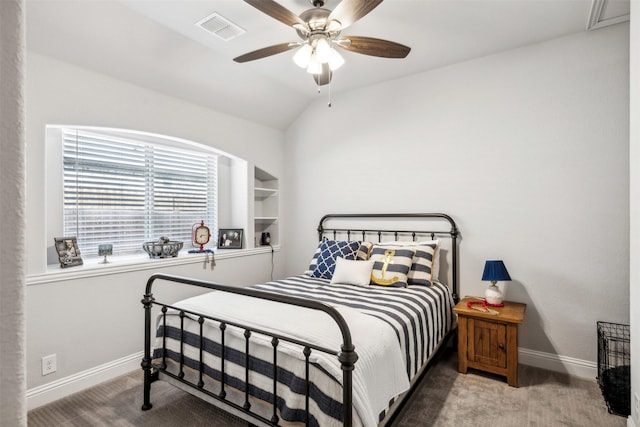 carpeted bedroom with ceiling fan and lofted ceiling