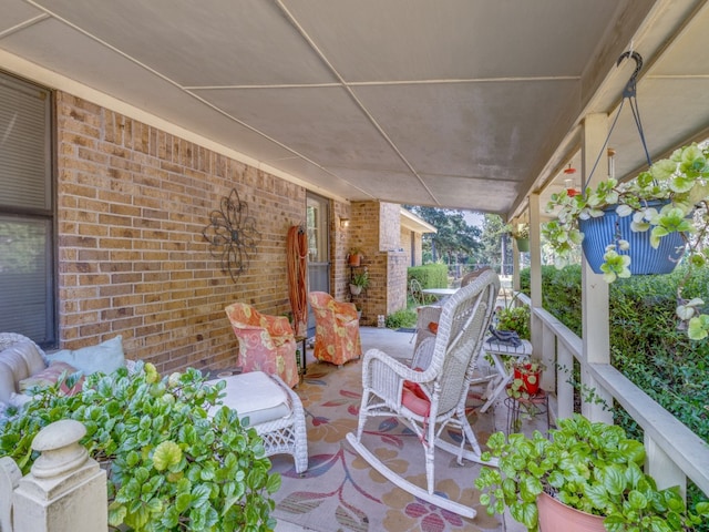 view of patio / terrace with a balcony