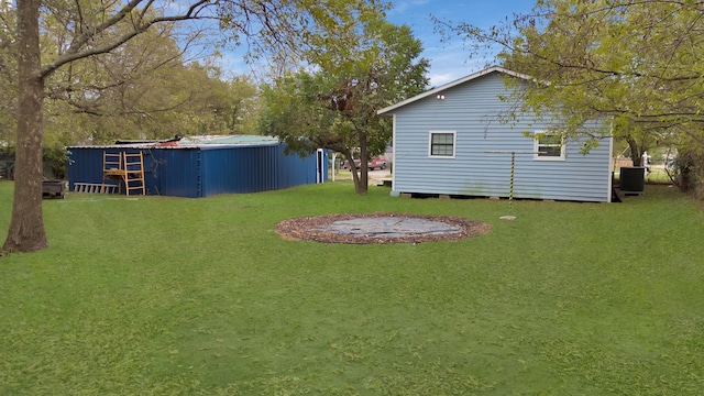 view of front of home with a front lawn and a patio