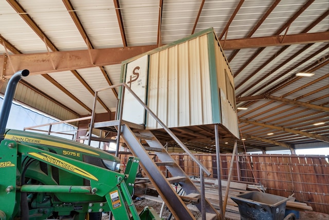 staircase featuring vaulted ceiling with beams