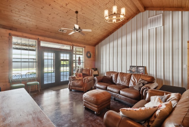 living room with concrete flooring, wood ceiling, high vaulted ceiling, ceiling fan with notable chandelier, and french doors