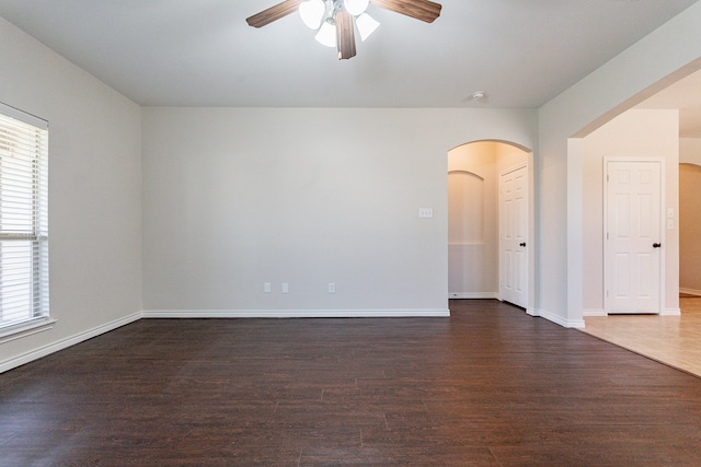 spare room featuring hardwood / wood-style flooring and ceiling fan