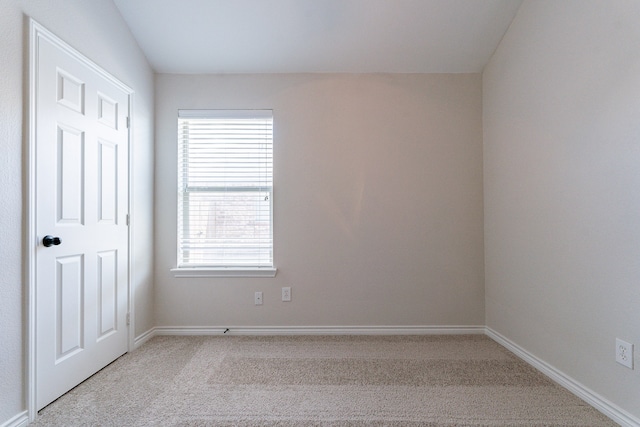 empty room featuring carpet floors and a healthy amount of sunlight