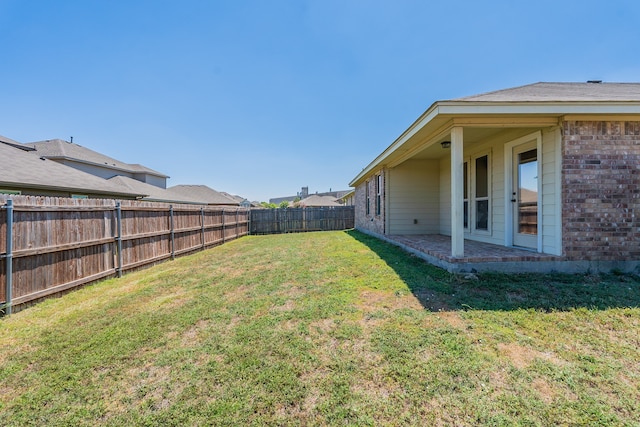 view of yard with a patio area