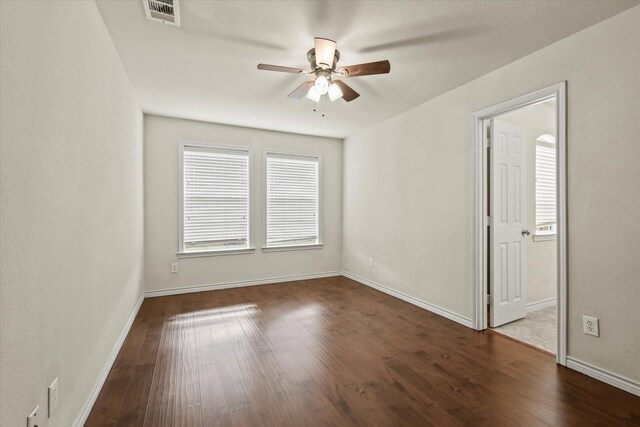 unfurnished room featuring ceiling fan and hardwood / wood-style floors