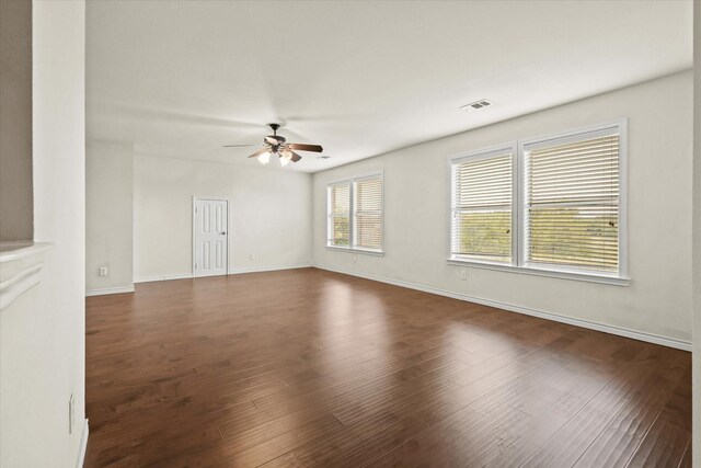 spare room featuring ceiling fan and wood-type flooring