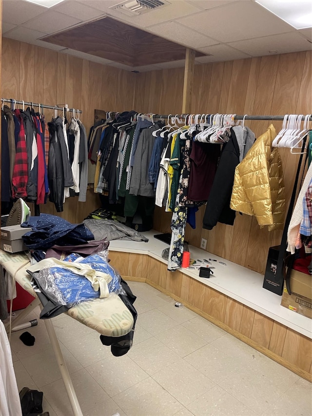 walk in closet featuring a paneled ceiling