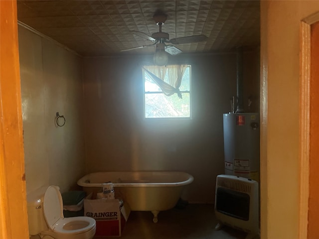 bathroom featuring toilet, heating unit, a tub, and ceiling fan