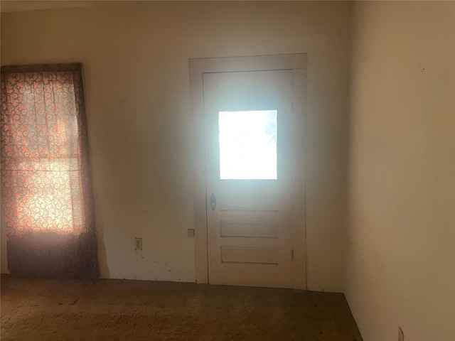 foyer with carpet