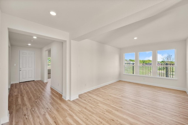 unfurnished room featuring light hardwood / wood-style flooring