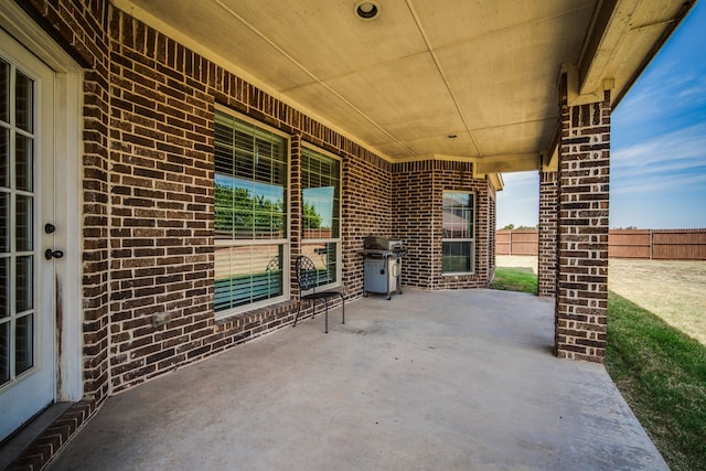 view of patio featuring a grill