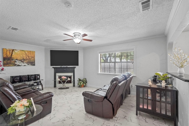 living area with visible vents, marble finish floor, ceiling fan, and ornamental molding