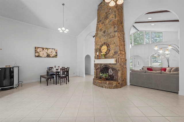 living room with arched walkways, high vaulted ceiling, light tile patterned flooring, and ornamental molding